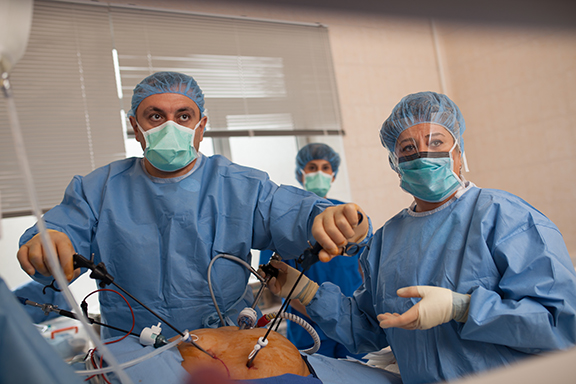 General and vascular surgeon Dr. George Mutafyan and GAMC surgical technician Juliet Khodadadi at the Noyemberyan Hospital operating room