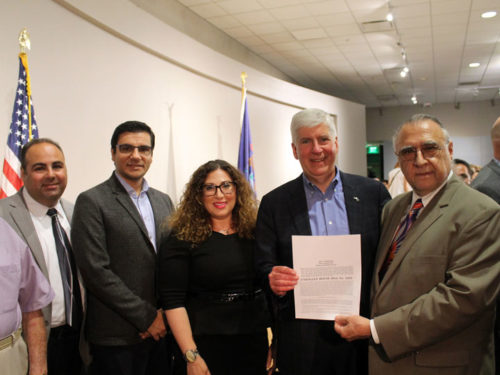 ANC of MI team members, Ara Topouzian, Lara Nercessian, Hovig Kouyoumdjian, and AGEC chairperson, Edward Haroutunian with Governor Rick Snyder.
