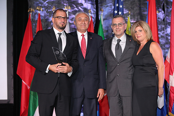 Sevag Koundakjian and Lalig Koundakjian receiving their late father's, Varoujan Koundakjian, Legacy Award with ANCA-WR Advisory Board member Karo Khanjian and ANCA-WR Board member Sako Berberian