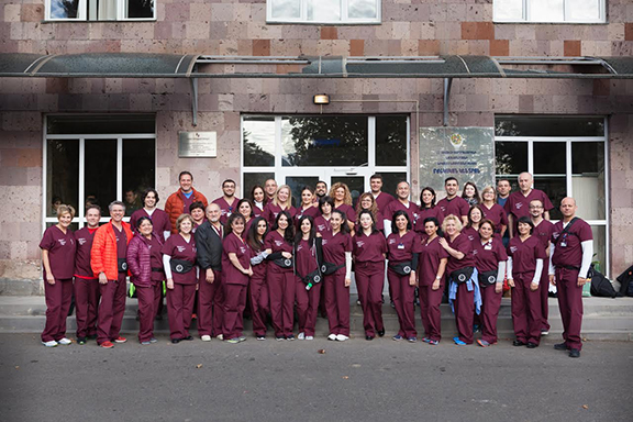 The Glendale Adventist Medical Center missionaries in front of the Noyemberyan Hospital in Armenia, during the joint ArmeniaFund-GAMC Medical Mission. (Photo: Areg Balayan)