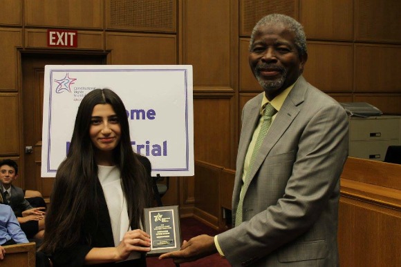 Anya receiving award from CRF