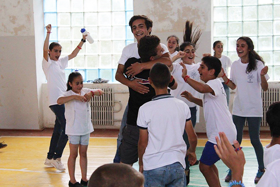 2016 Youth Corps Participant Hovig Zaki cheering with campers