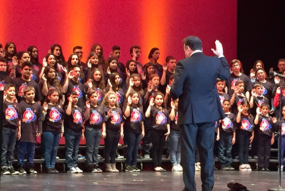 Artsakh war veteran Shahen Aghababian officiates the pledge ceremony for 126 new AYF Juniors