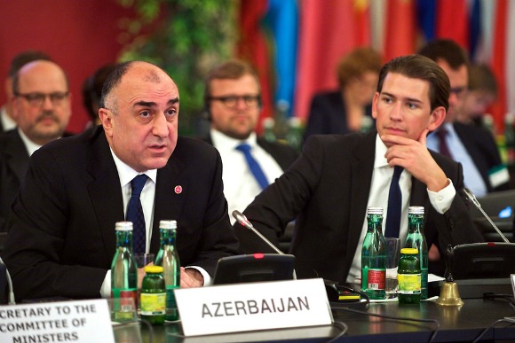 Azerbaijani Minister for Foreign Affairs Elmar Mammadyarov (left) talks about the priorities his country will have during its six-month chairmanship of the Council of Europe in Vienna on May 6. Amid criticism of his country on liberties issues, Mammadyarov vowed to show "strong support" for human rights by making it one of the pillars of the chairmanship. (Photo: Council of Europe/Sandro Weltin)